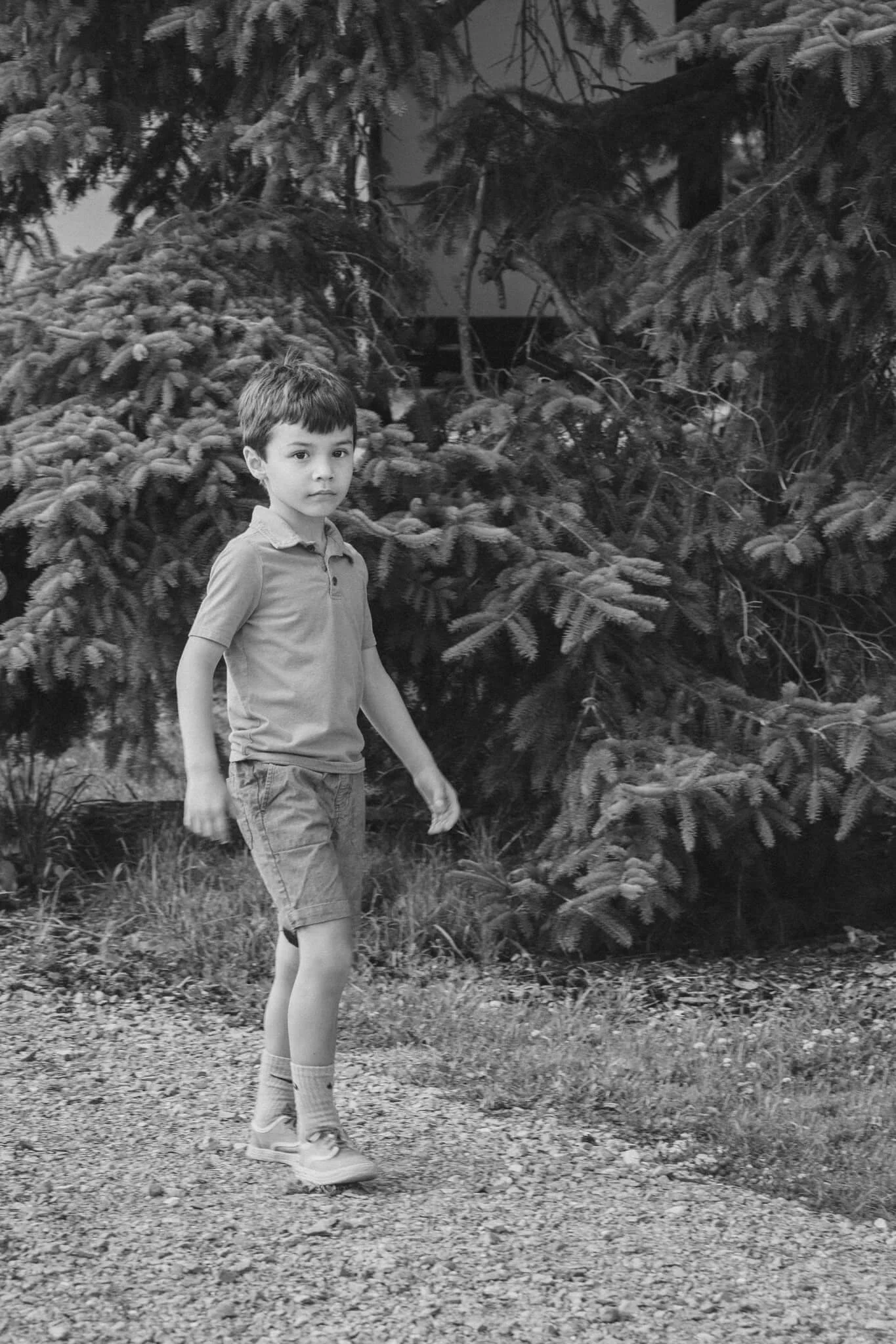 portrait-boy-child-walking-black-white.jpg