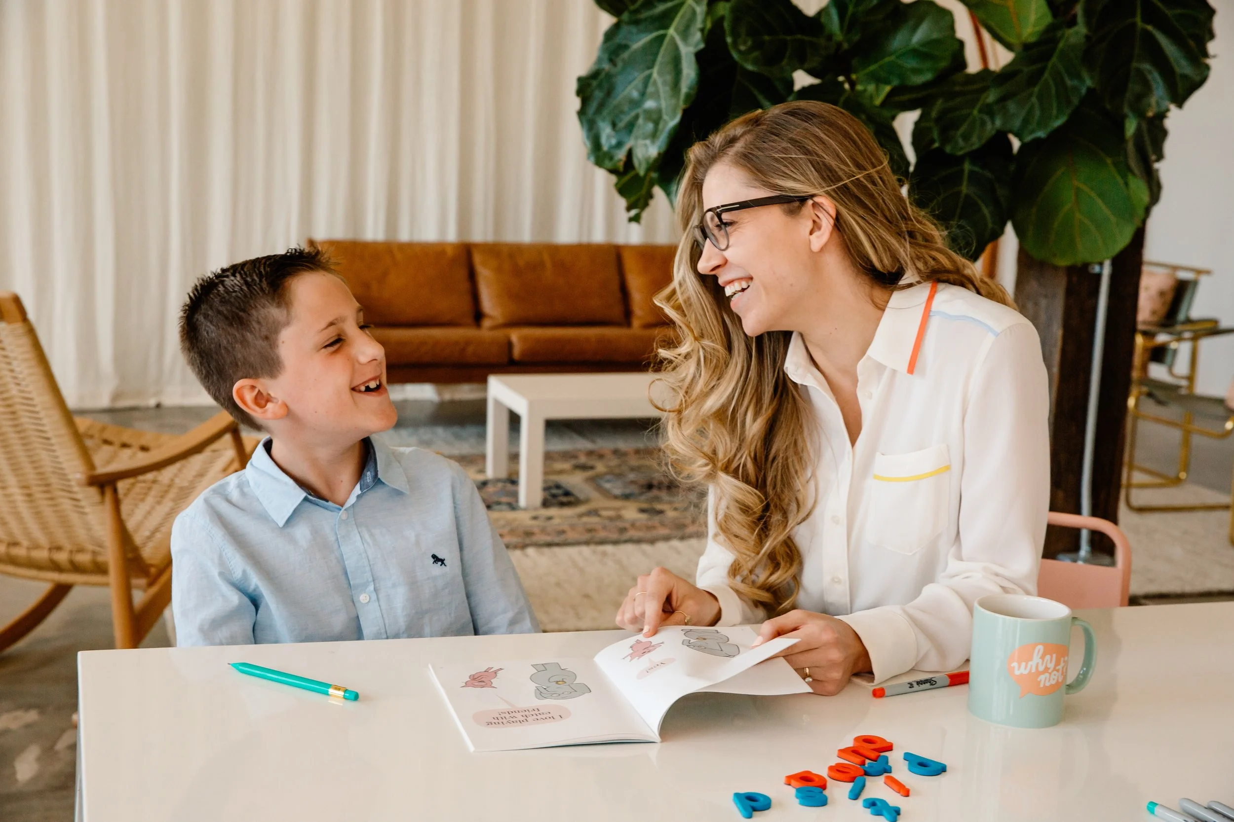 Student and Teacher Reading a Book