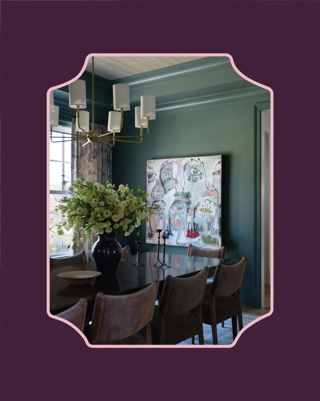 Image of a dining room - dining table with chairs around it. A chandelier with linen shades hangs above the table.
