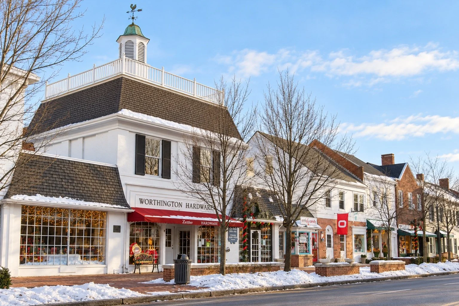 Historic storefronts along High Street in Old Worthington in winter.