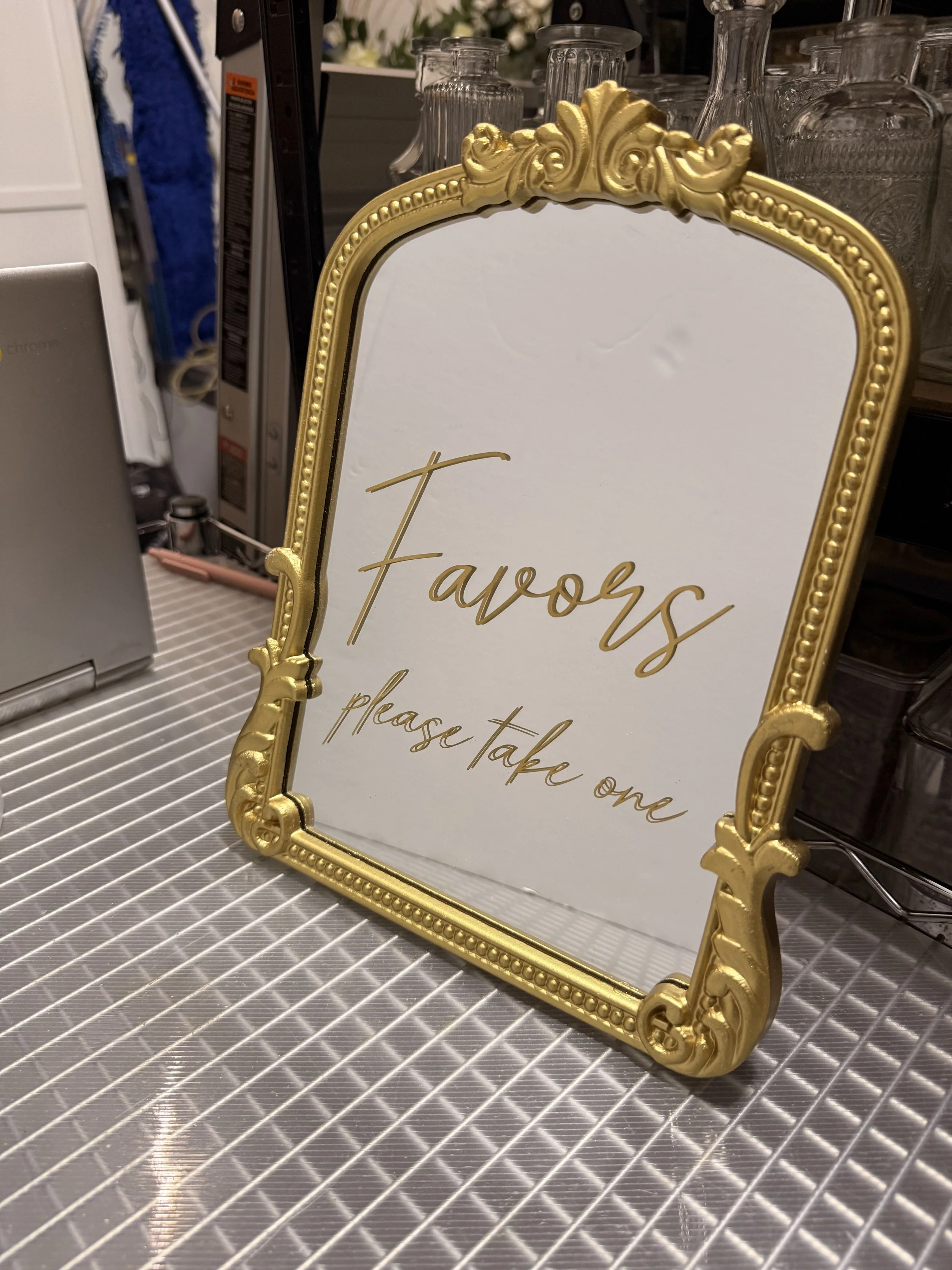 Favors sign - gold frame