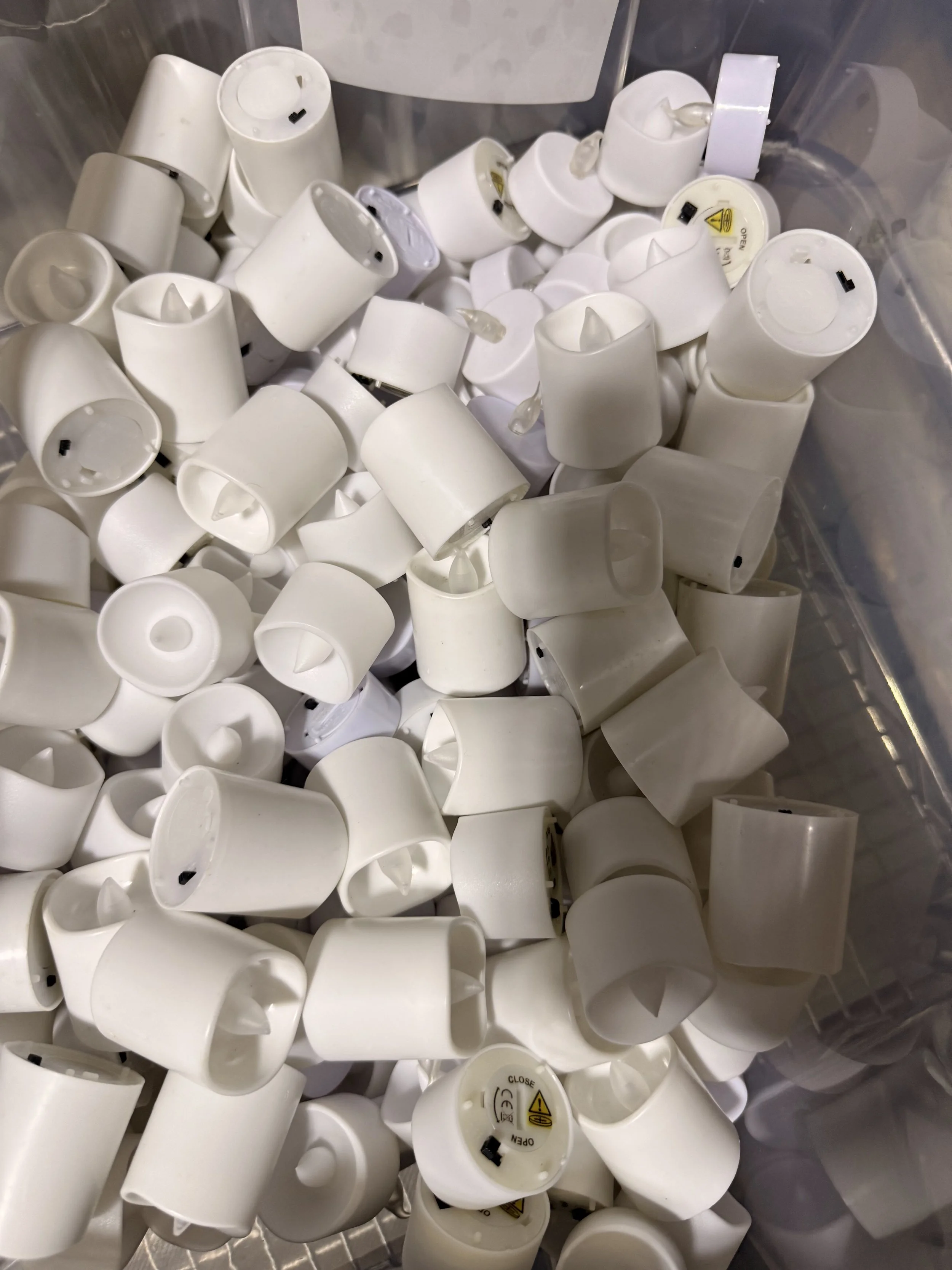 Flameless votives and tealights (a lot)