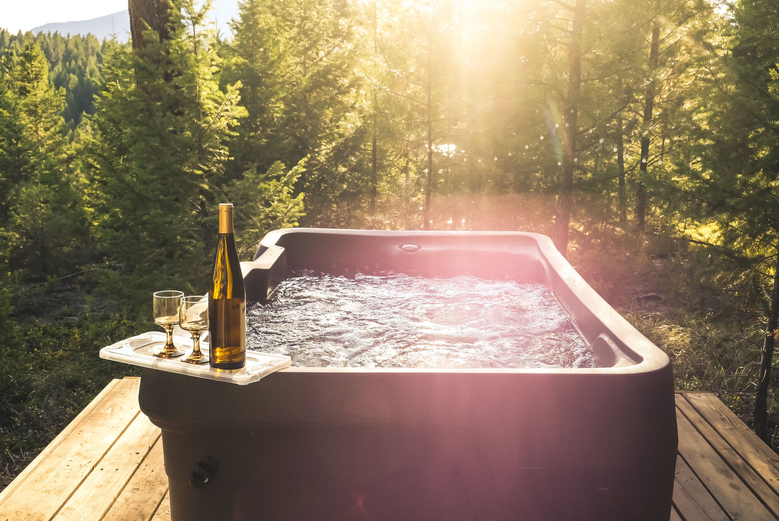 Shared Hot Tub at The Hohnstead Glamping Cabins Resort near Missoula, Montana