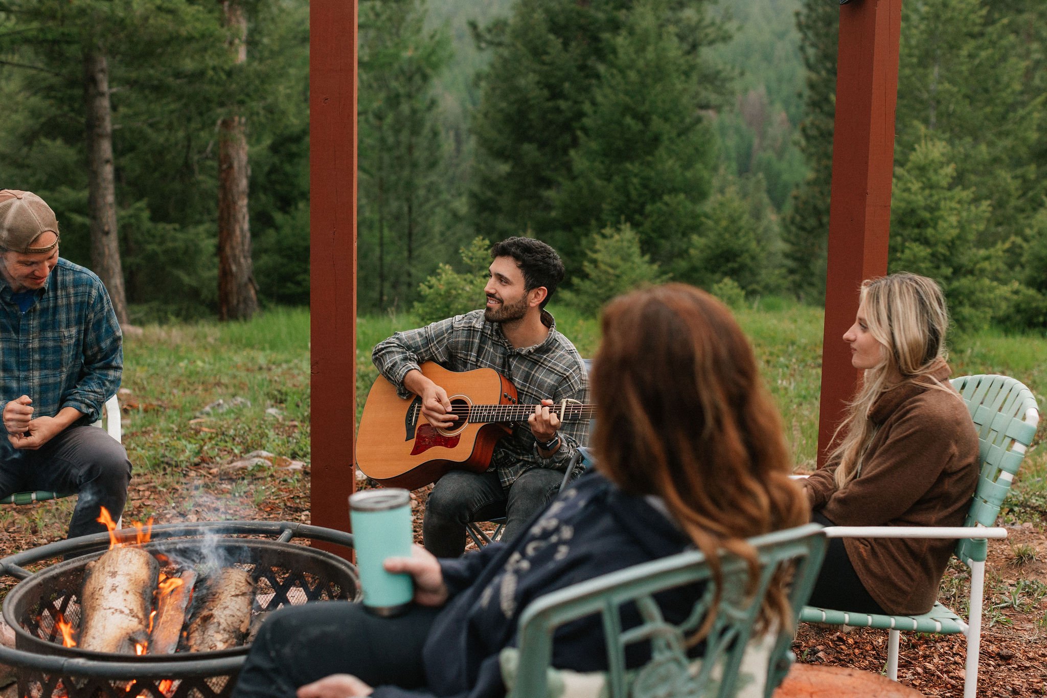 Campfire evenings at The Hohnstead Glamping Cabins Resort near Missoula, Montana