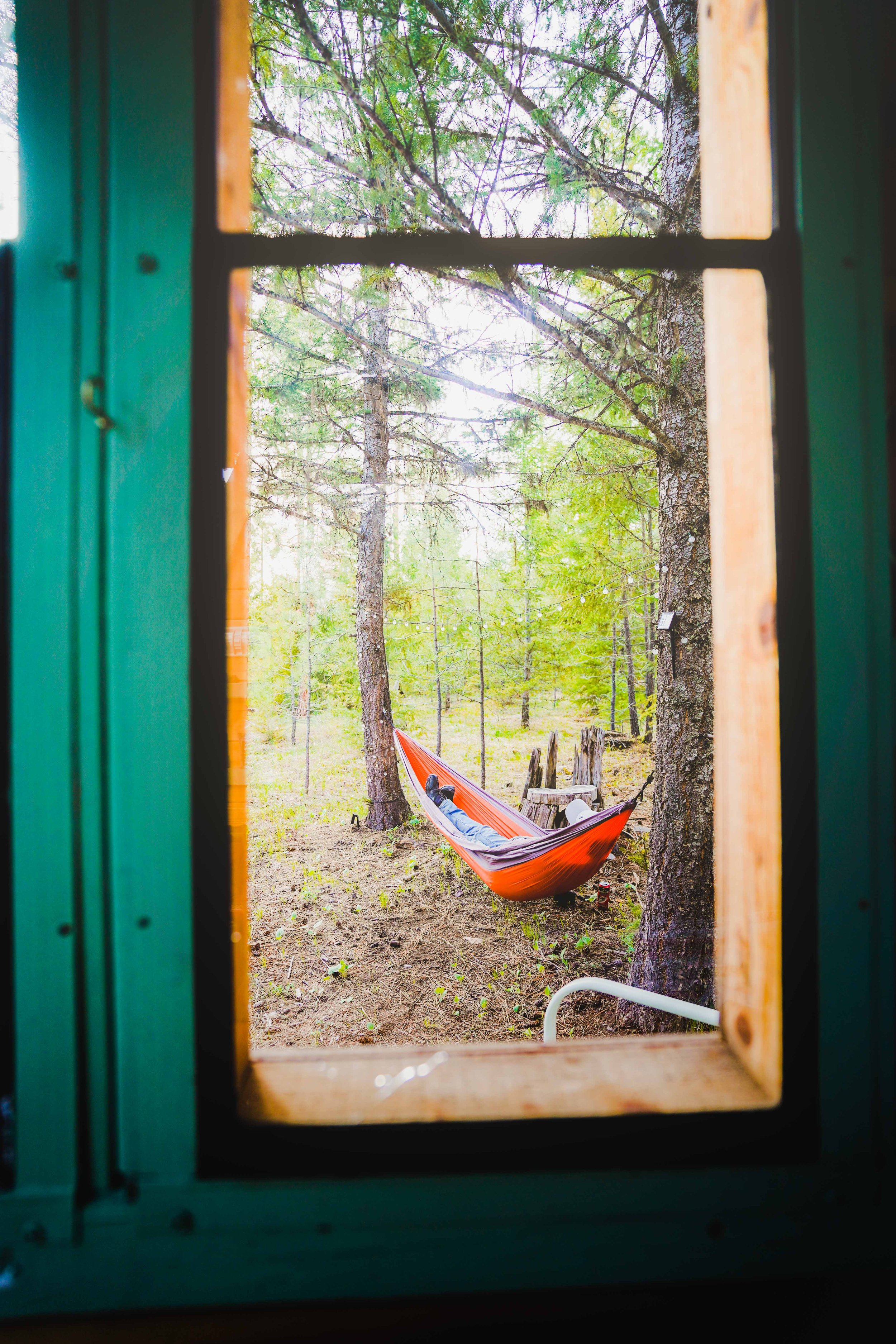 A relaxing view outside The A-frame Cabin at The Hohnstead Glamping Cabins Resort near Missoula, Montana