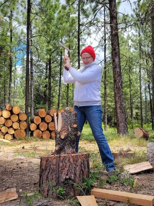 Splitting wood at The Hohnstead Glamping Cabins near Missoula, Montana