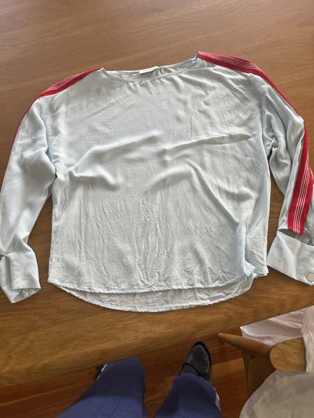 Sandro - pale blue top with red knit stripe sleeves