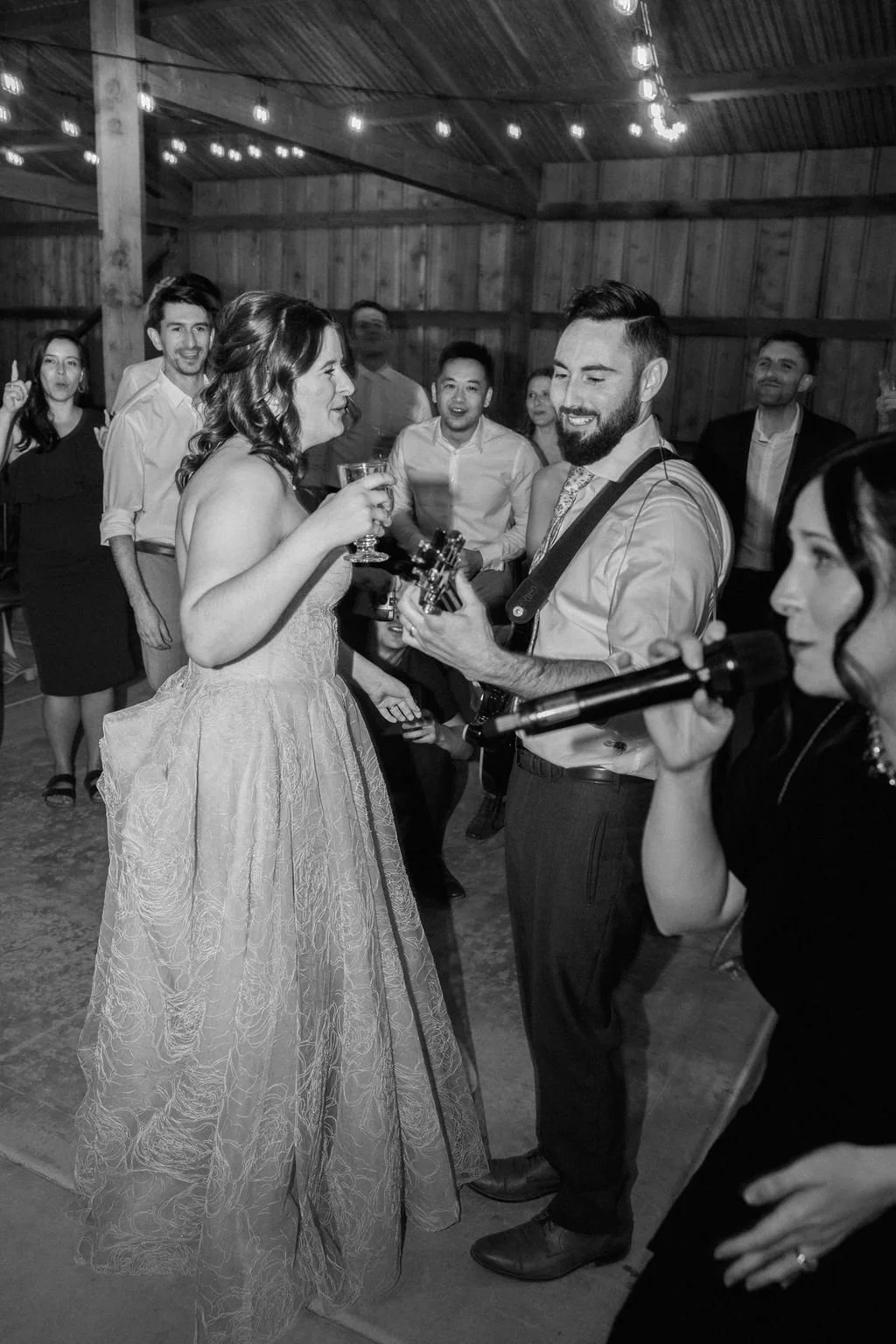 Groom plays guitar for bride