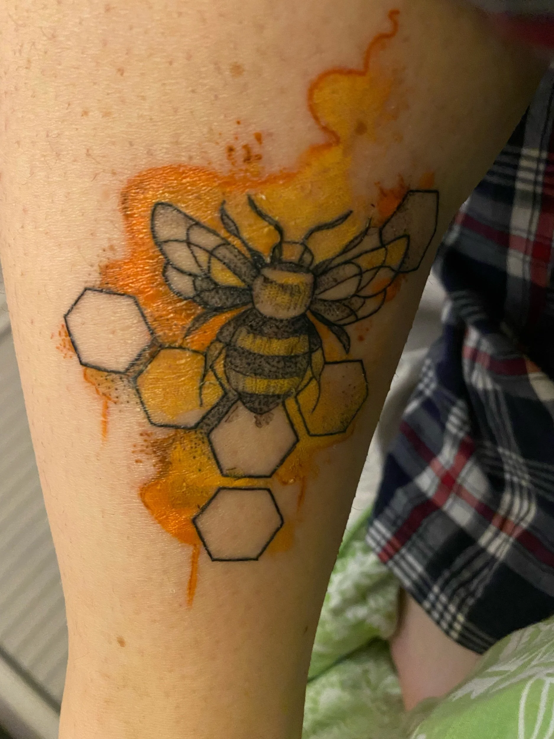 Another shot of my bee tattoo .