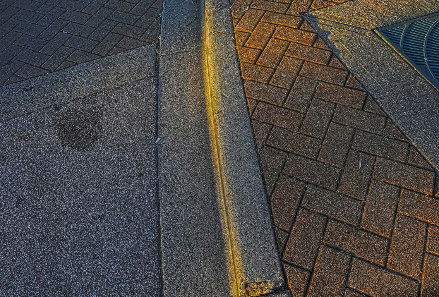  With some of the photographs in this series, I wanted to explore the man made and natural organic images created within spaces, such as those created by the shadows in a parking lot at sunset.     This photo is also posted at  Steven Lee's flickr . 