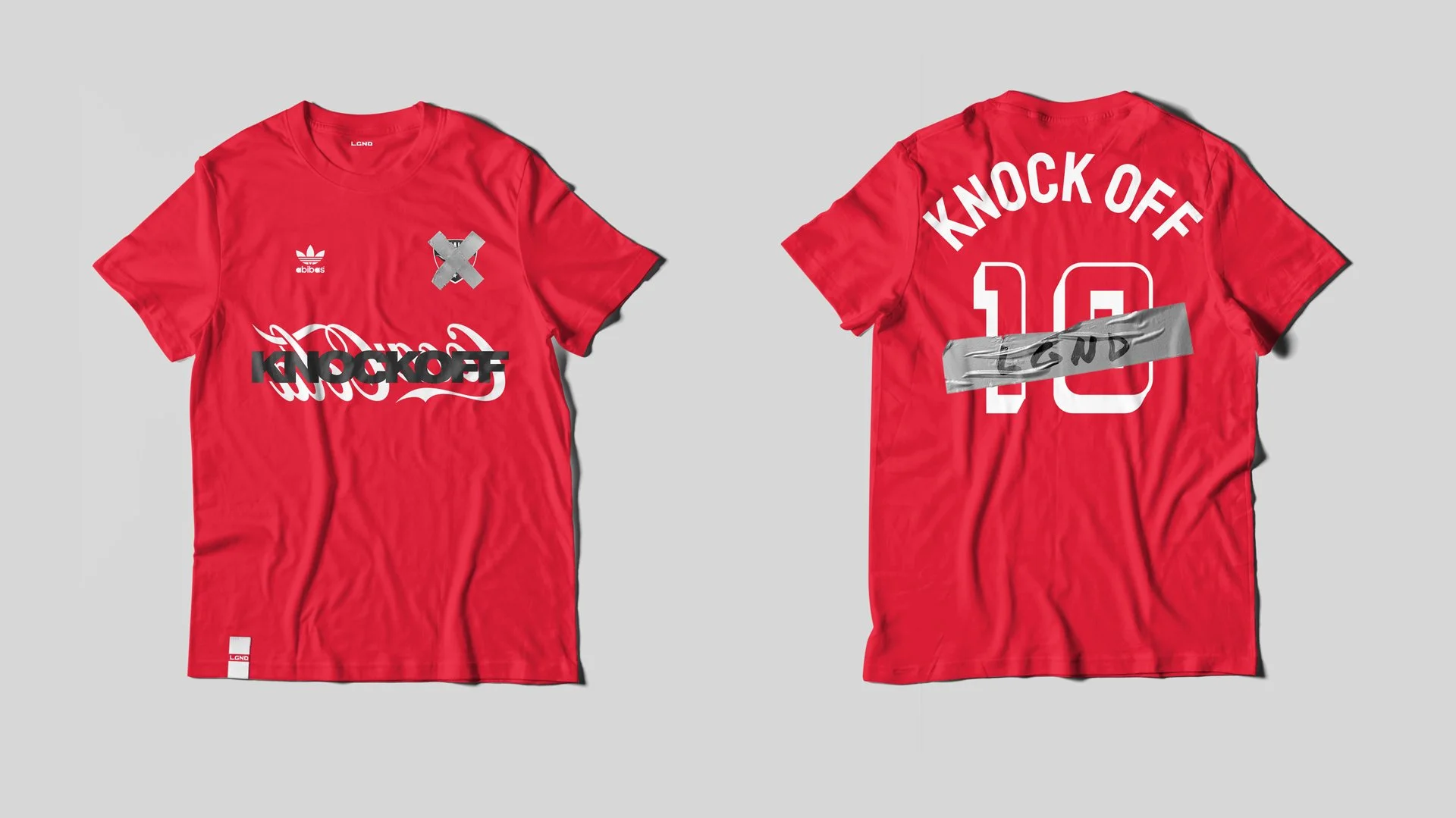 Red athletic t-shirt with various graphics and printed text, shown from front and back.