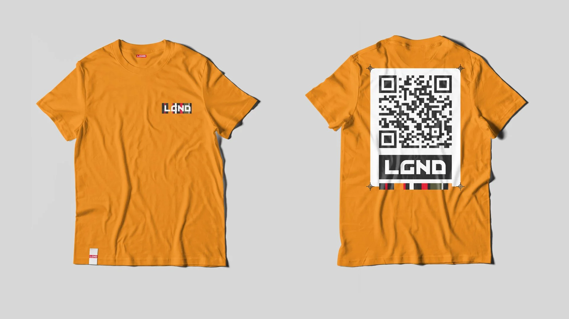 Orange T-shirt with a small graphic logo on the front left chest and a barcode with the text LGND on the back