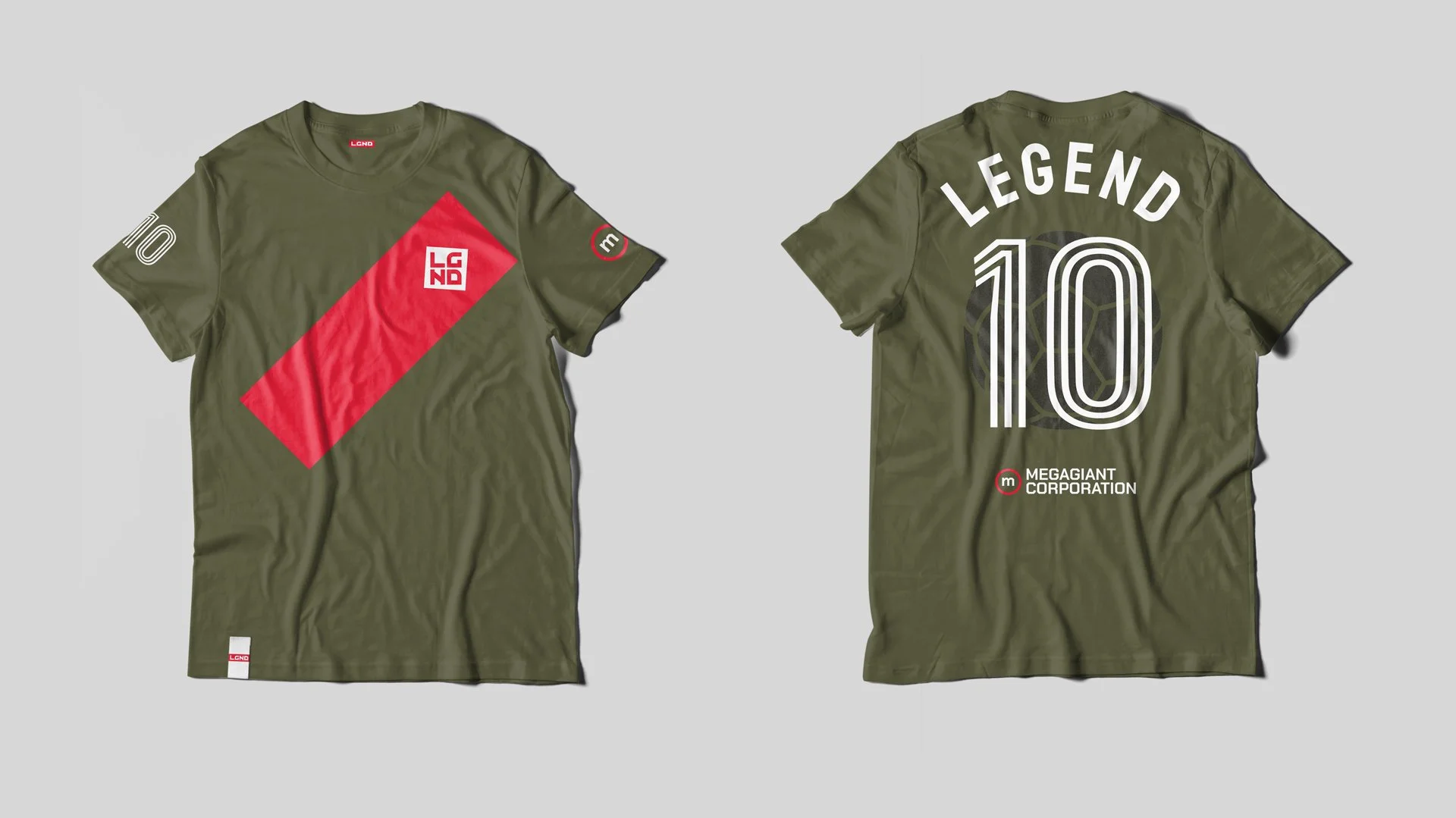 Olive green T-shirt with graphic design. Front features a red diagonal stripe with 'LGND' logo; sleeves have circular patches. Back has large 'LEGEND 10' text and 'MEGAGIANT CORPORATION' logo.
