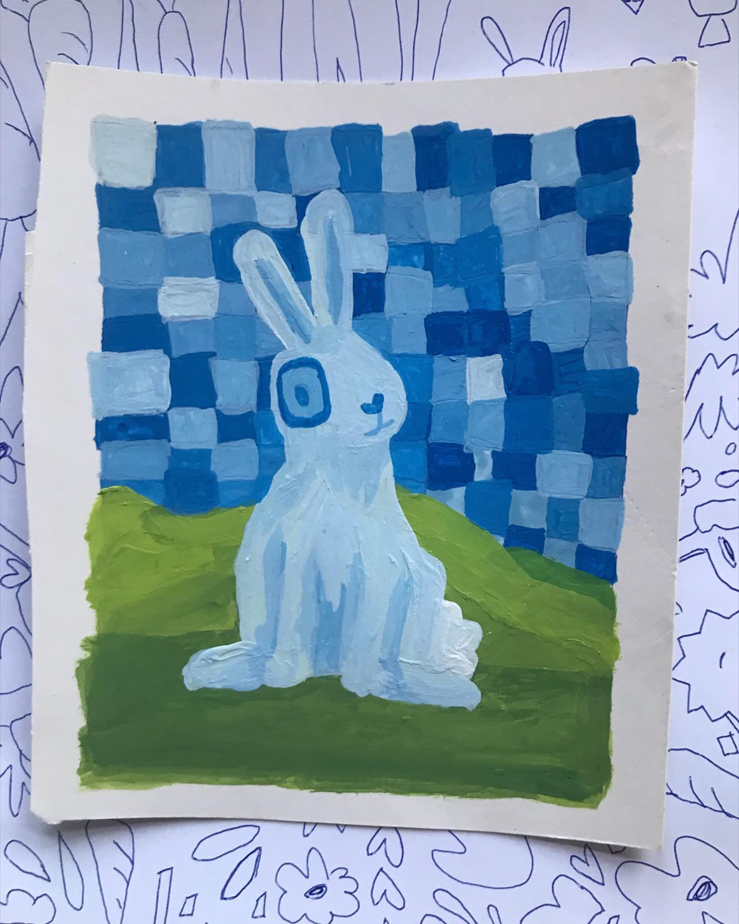 🐇🟦 A little blue bun bun for spring time 💙 a friend told me it reminded them of the old Windows background artwork. The rolling green grass hills. Anyone else remember that!? It must have been floating around my subconscious 🖼💻🌱#bunnyart #bluer