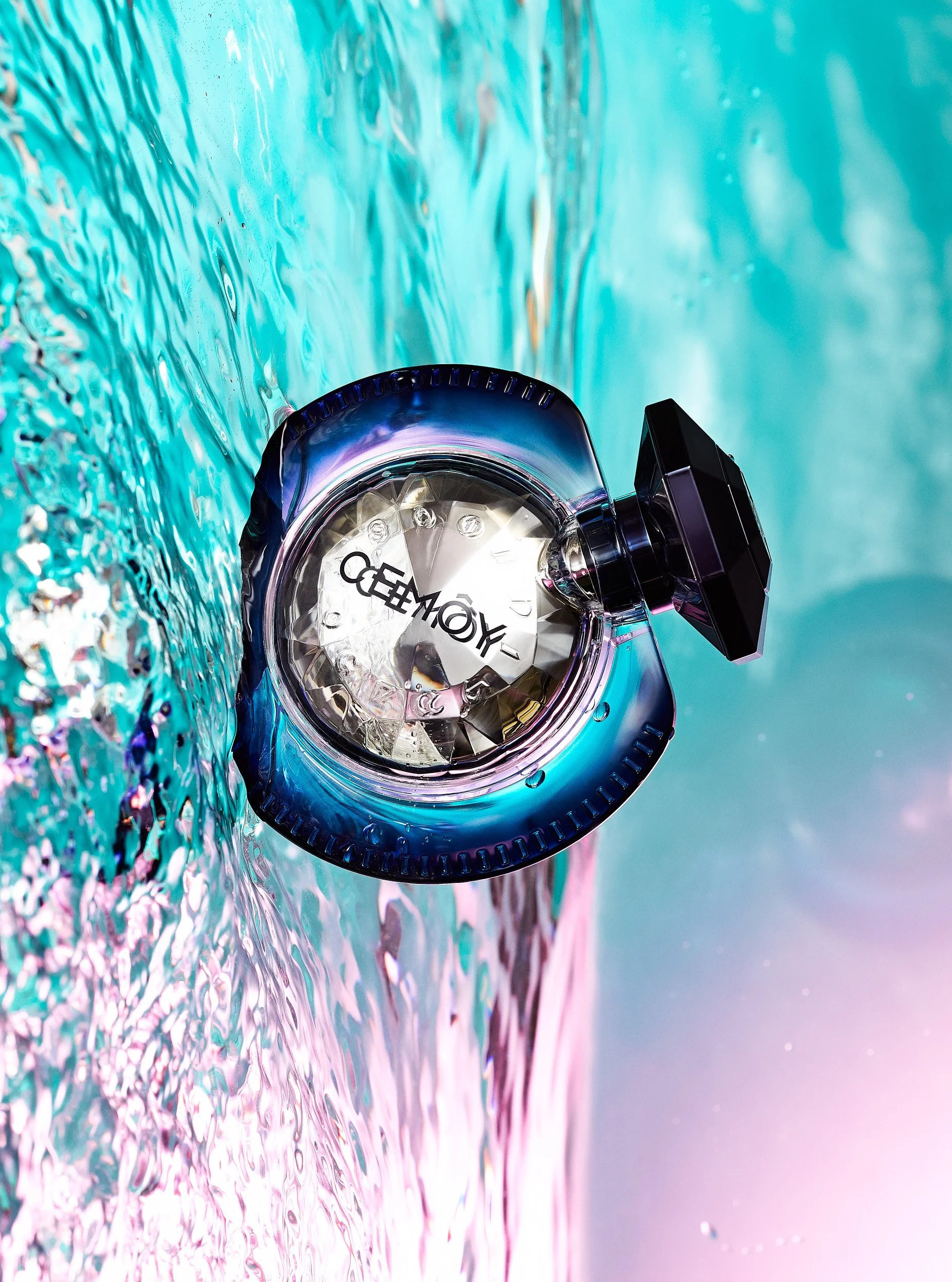 A colorful clock submerged in water with a rainbow-like background.