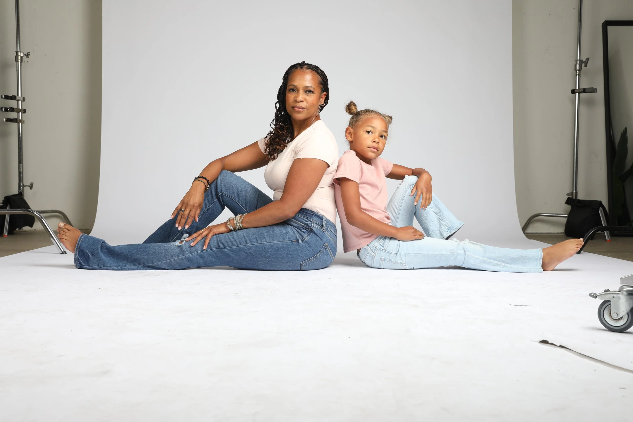 Rho and Aria sharing a joyful moment during a photo shot