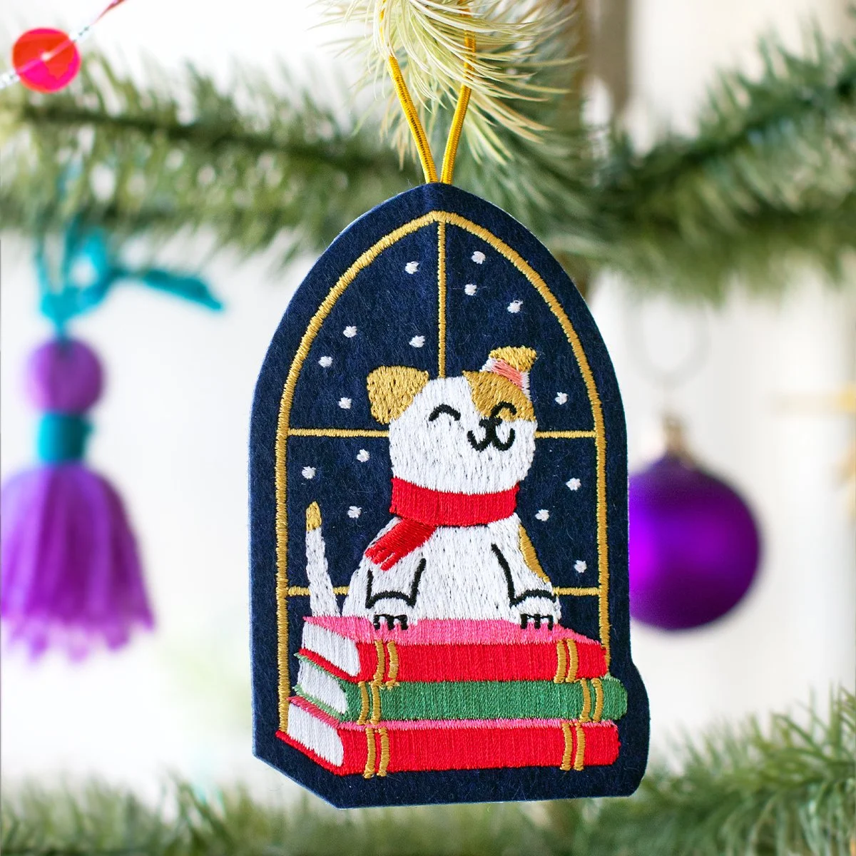 Book Stack Dog Ornament.Media-02.jpg