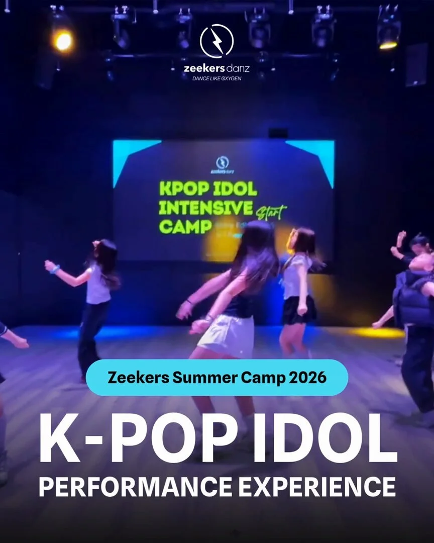 Post: kids dancing on the studio stage under coloured lights, with the words Zeekers Summer Camp 2026 and K-pop performance experience.