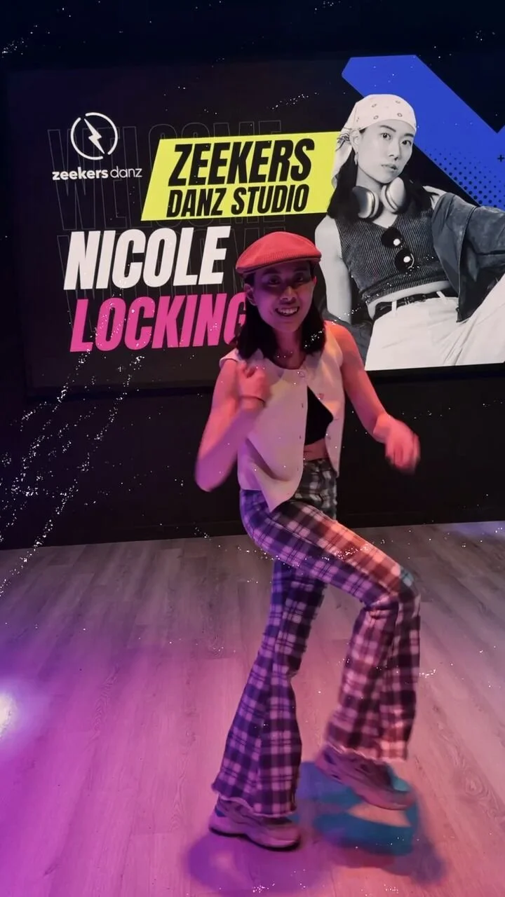 Reel still: an instructor dancing in front of a poster for her locking class.