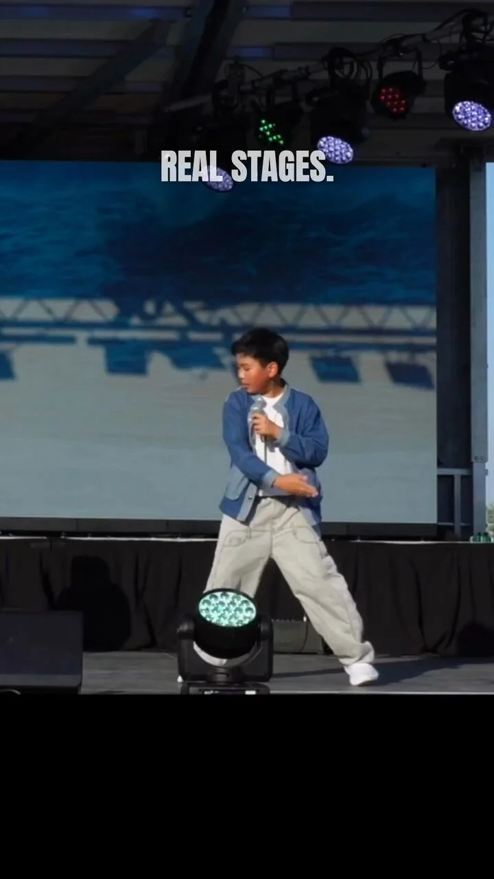 Reel still: a young dancer on an outdoor stage under the words Real stages.