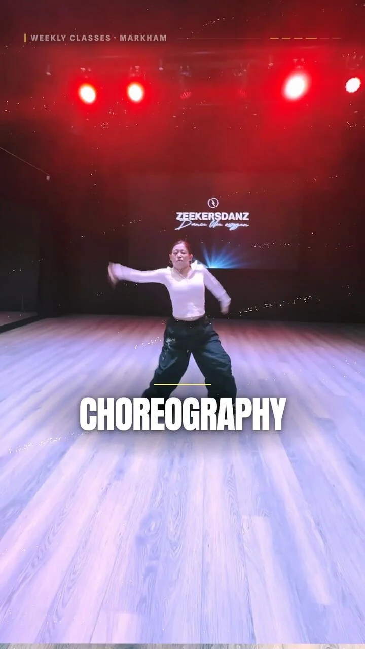 Reel still: a dancer mid-move on the studio floor under red lights, with the word Choreography.