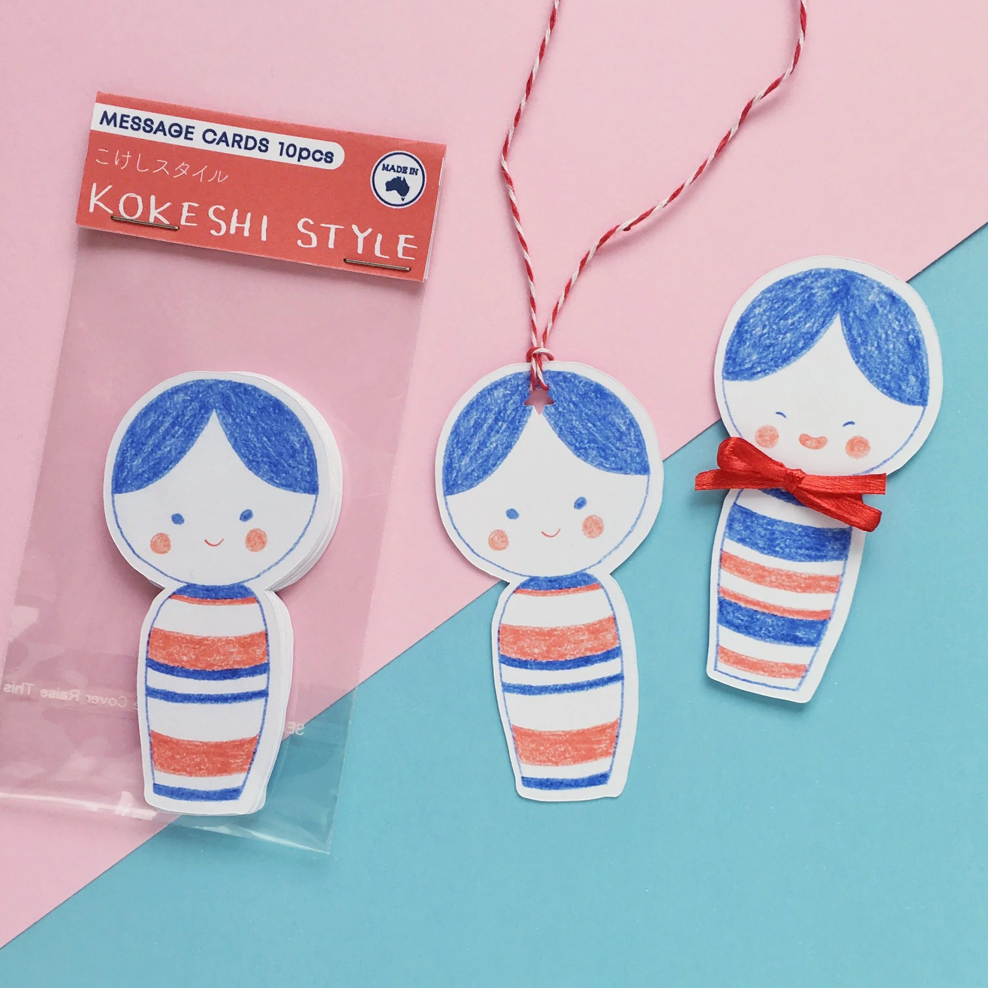 Die cut kokeshi doll note cards with 2 varieties. Example packaged and unpackaged