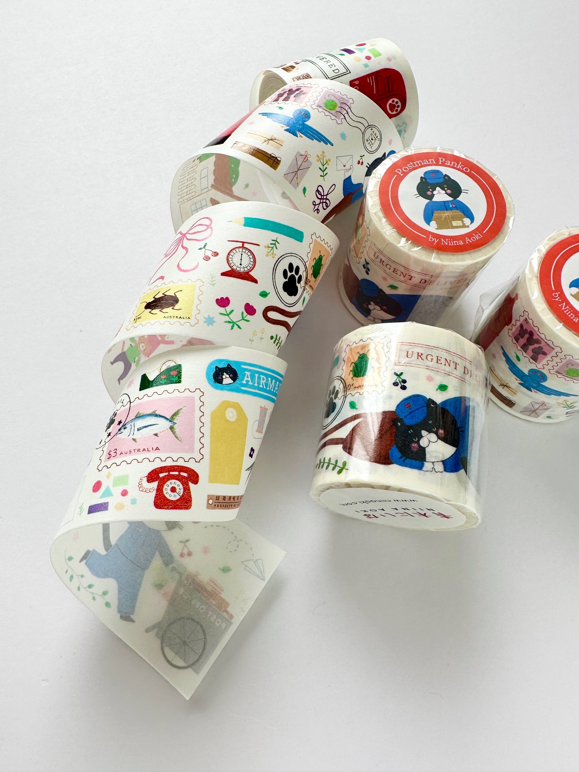 paper washi tape of a postman cat delivering mail