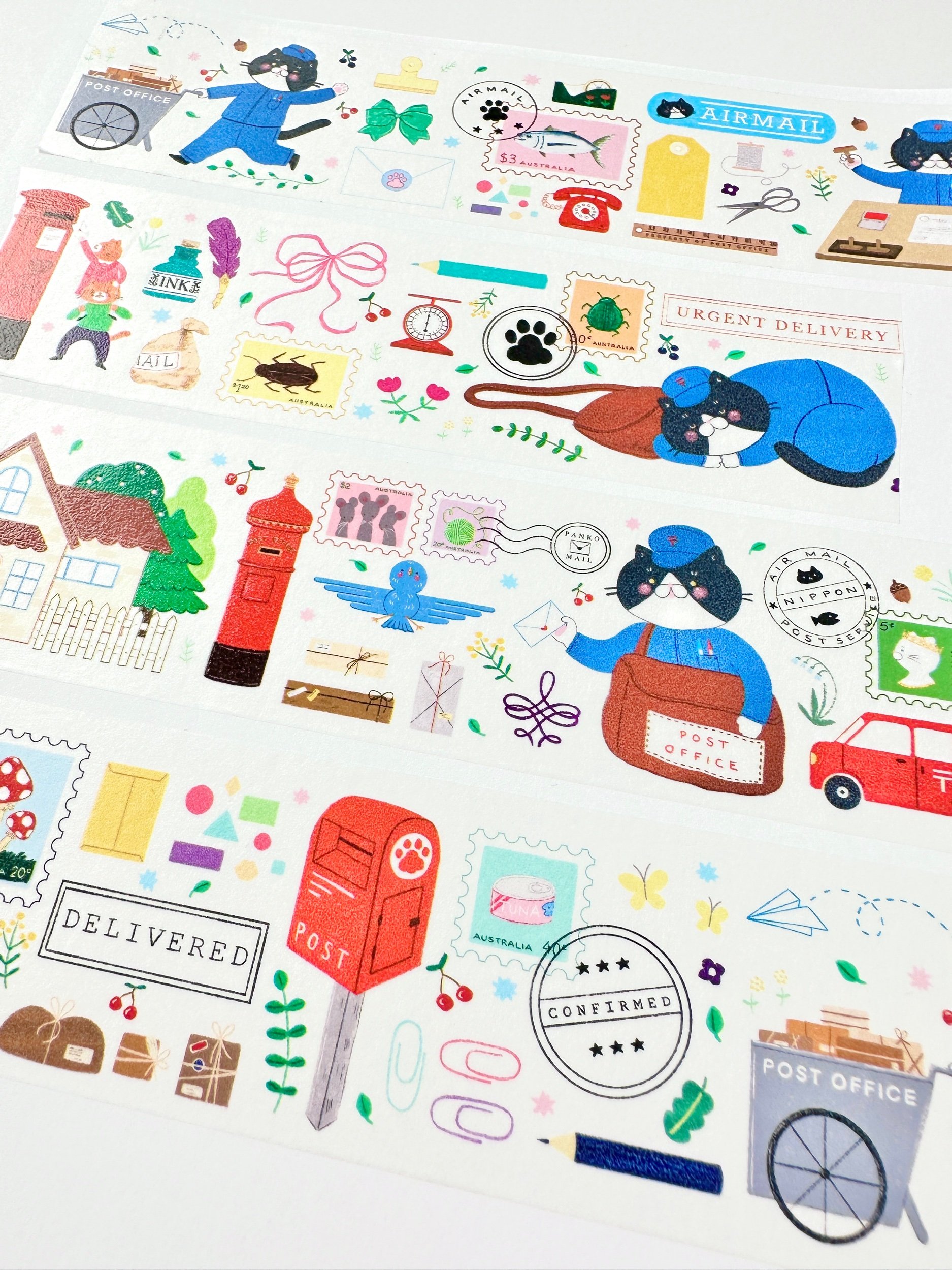 paper washi tape of a postman cat delivering mail