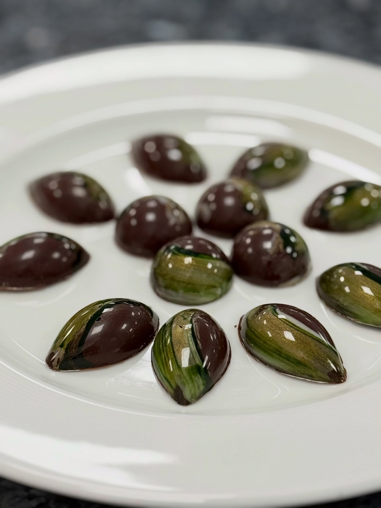 Proof that the chaos in the kitchen was worth it. After all the mess &mdash; this is the reward.

Hand-tempered dark chocolate shells filled with a bright, silky lime ganache: sharp citrus, deep cocoa, and a finish that keeps you reaching for another