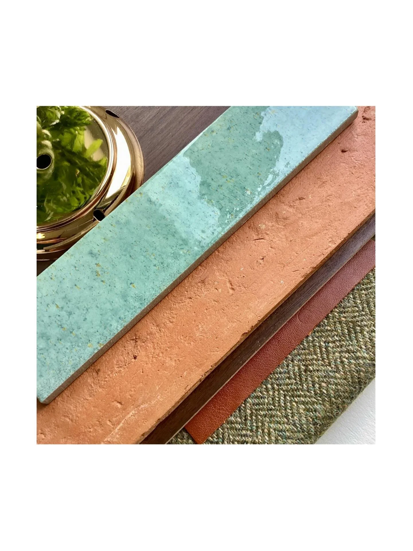 A study in warmth and texture... A crafted mix of texture and tone, shaping a relaxed lounge with a teal glazed tile against rough terracotta, wool herringbone upholstery, brown leathers, dark timber and polished brass accents. Every material is care