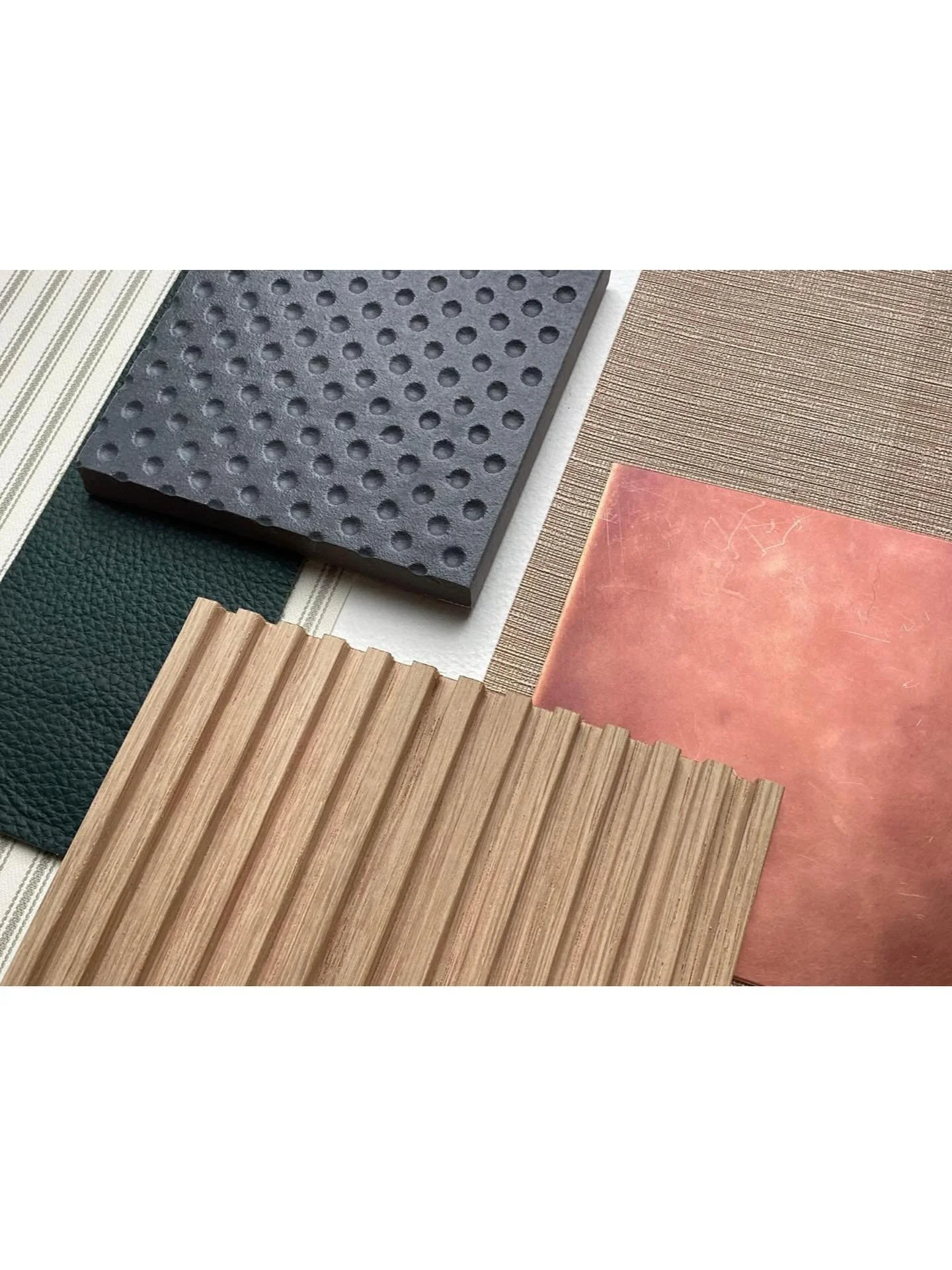 Crafted to complement, not compete. A light, layered palette designed for fashion retail, ribbed wood, soft green leather and distressed copper bring warmth and texture, while silvery tones and pitted flooring create balance. A space that feels fresh