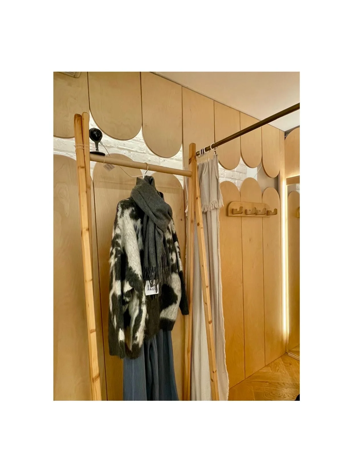 Each EMIN + PAUL store is conceived as a quiet extension of the brand itself, pared-back and purposeful. Every fixture, from clothing rails to chairs, is designed and handmade by creative director Paul Kim, reinforcing a sense of craft throughout the