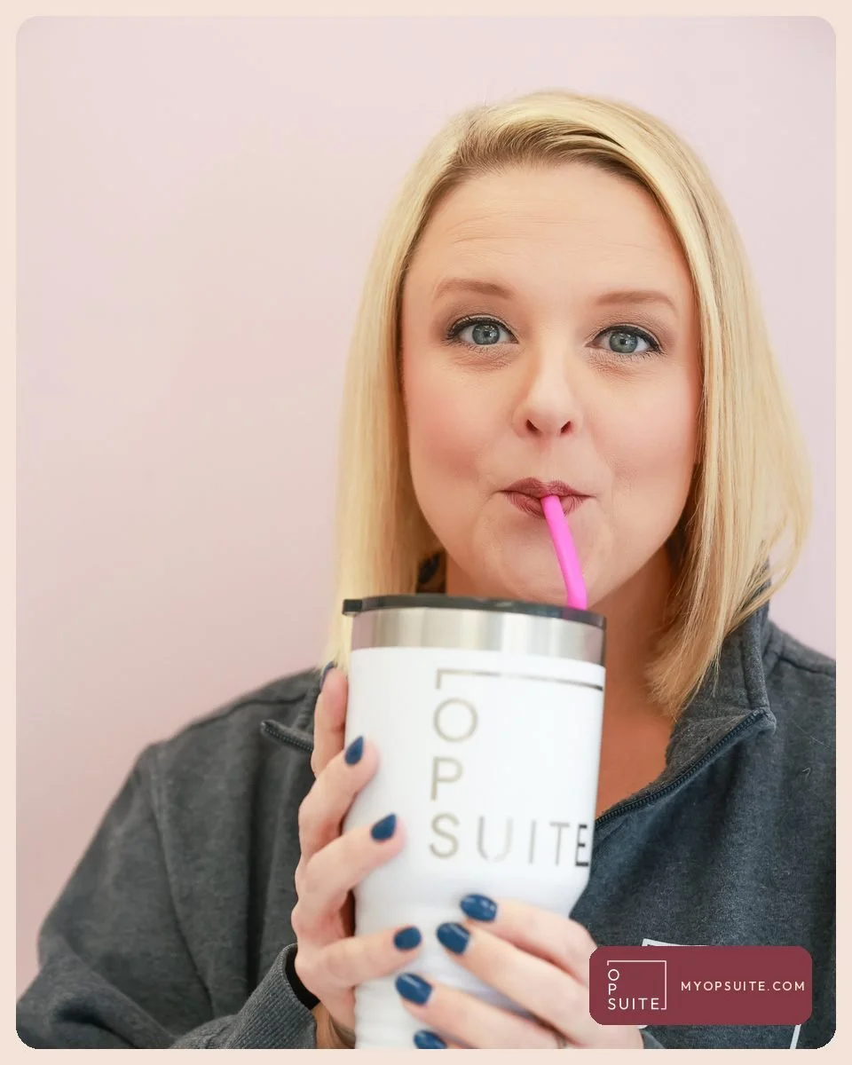Samantha Cox sipping from an OpSuite tumbler against a blush-pink wall
