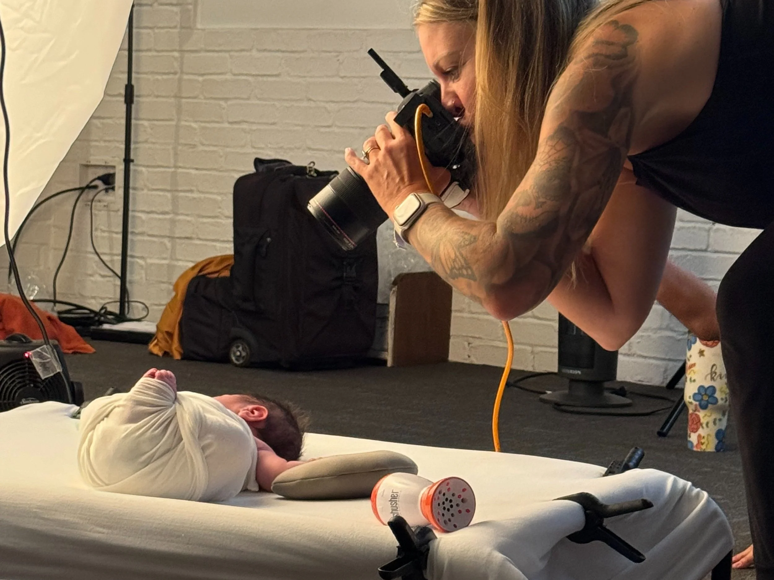 Dawn Potter photographing a baby at MNPS 2024
