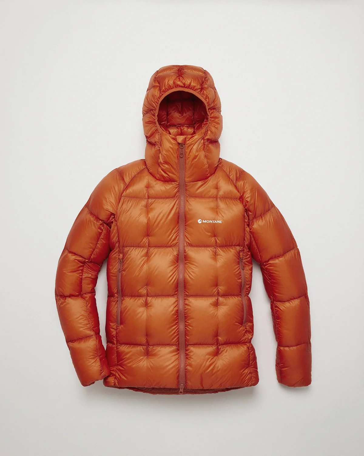 Orange puffer winter jacket with hood and logo on chest.