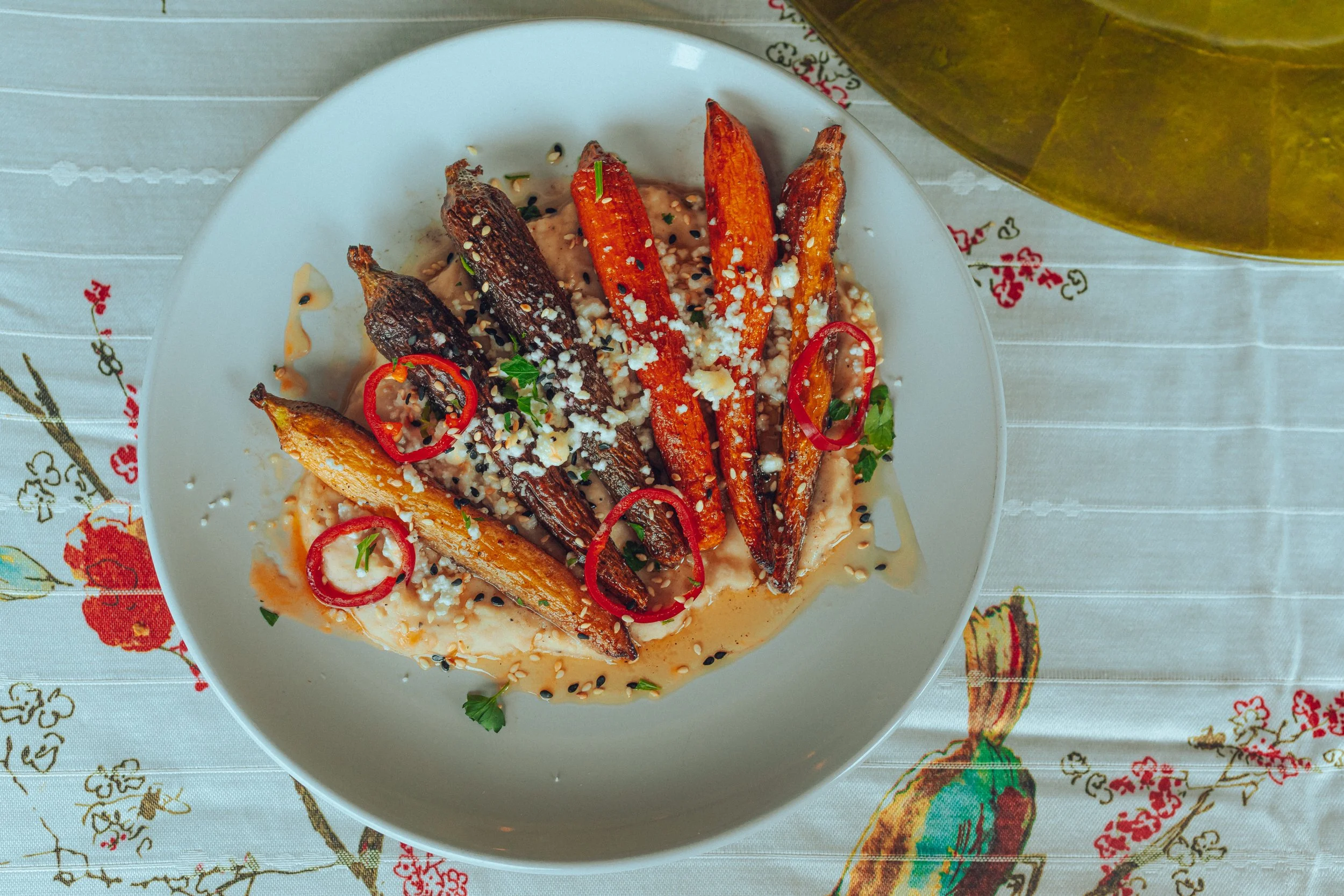 Honey harissa-glazed baby carrots