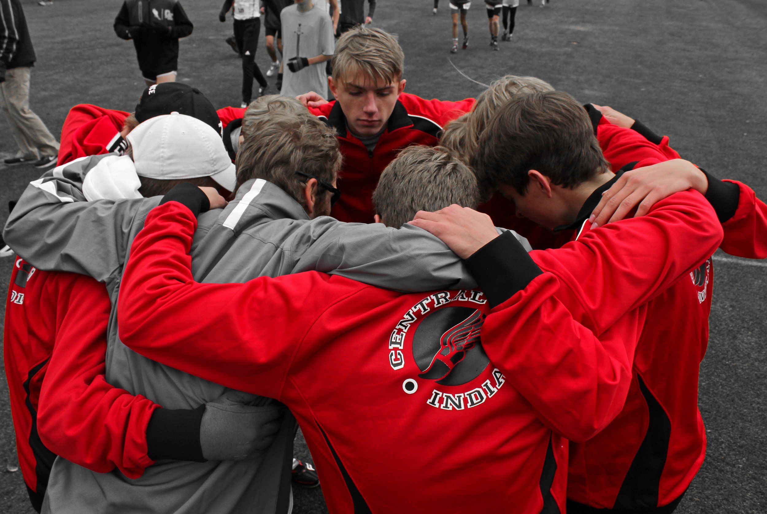 The Cheyenne Central High School boy’s cross country team huddles up before lining up for the Wyoming State Cross Country Championship 5k race in Afton, Wyoming on Oct. 26, 2019.
