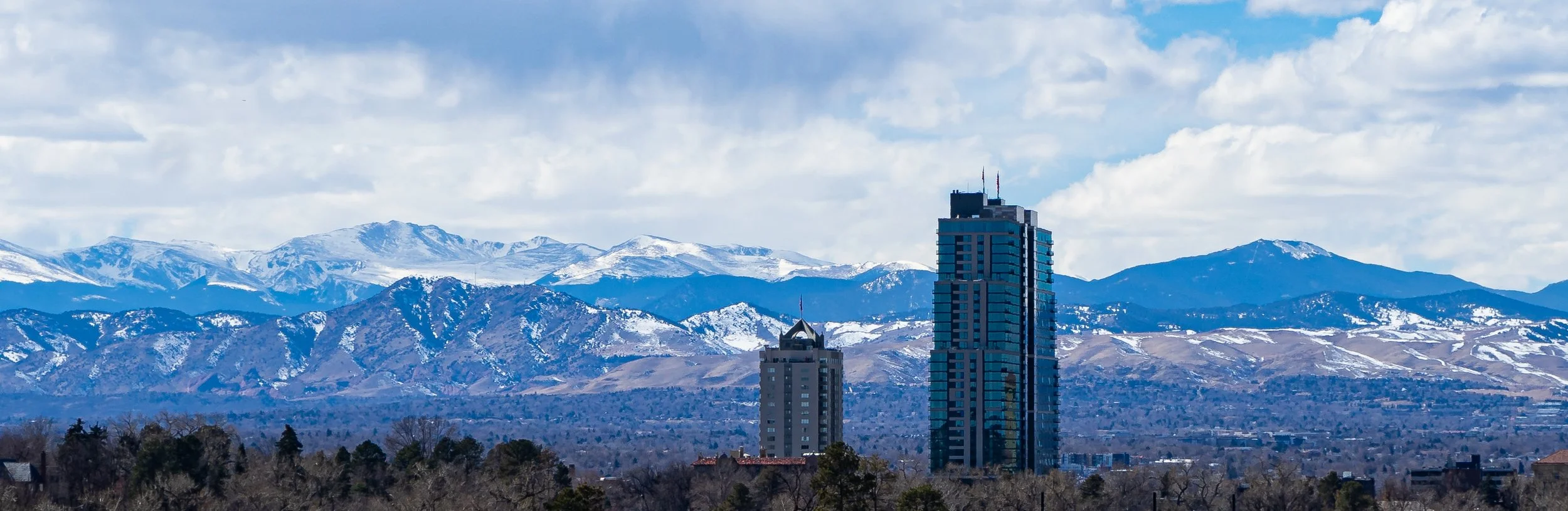 Nestled in the Rocky Mountains, Denver, Colo. and its suburbs include beautiful views of the Rockies. Skyscrapers protrude all around the city and litter the landscape. The Country Club Towers I, II and III are located in Cherry Creek, Colo. Towers I