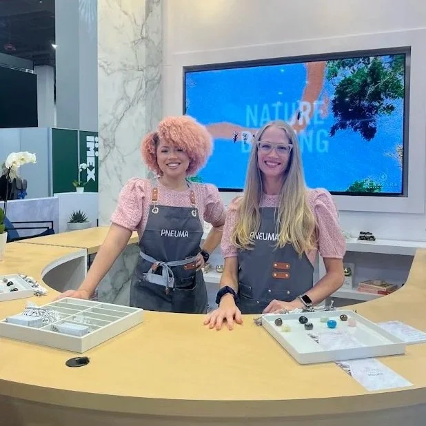 Pneuma Lab staff at tradeshow booth