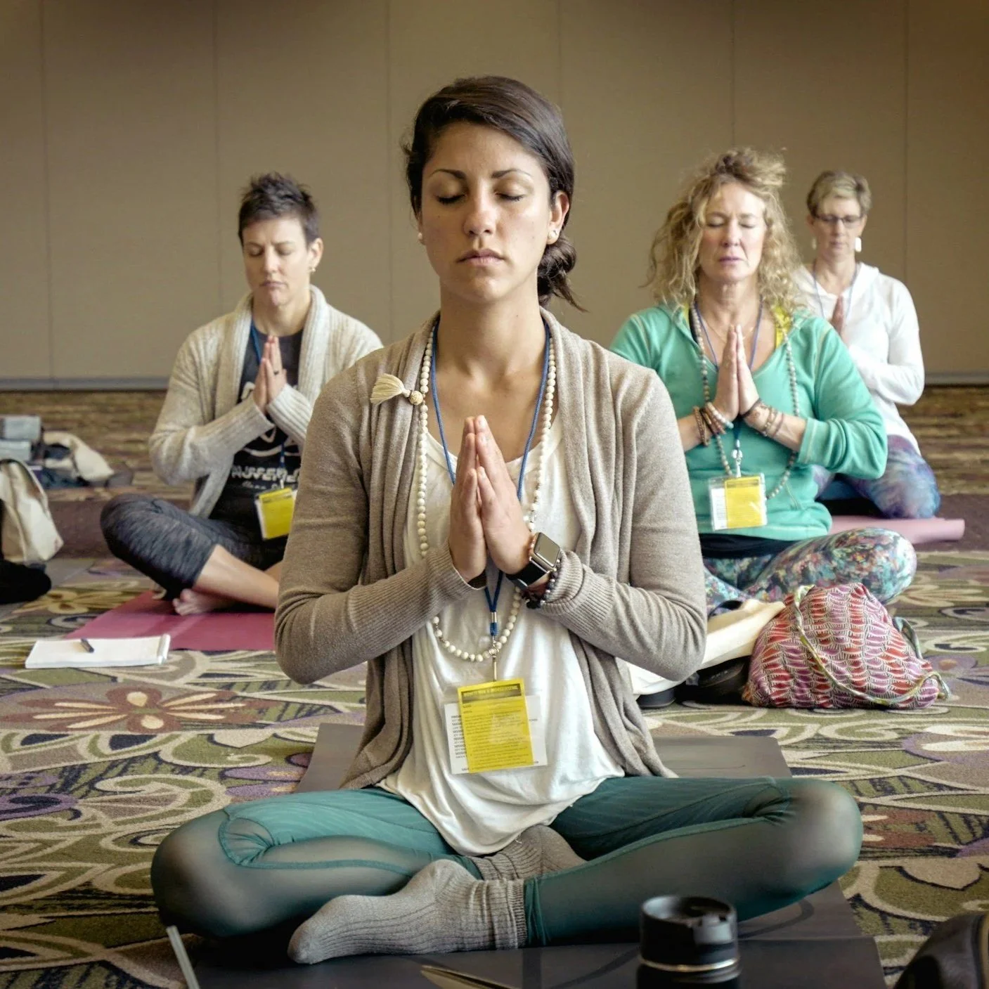 Woman meditating at a conference
