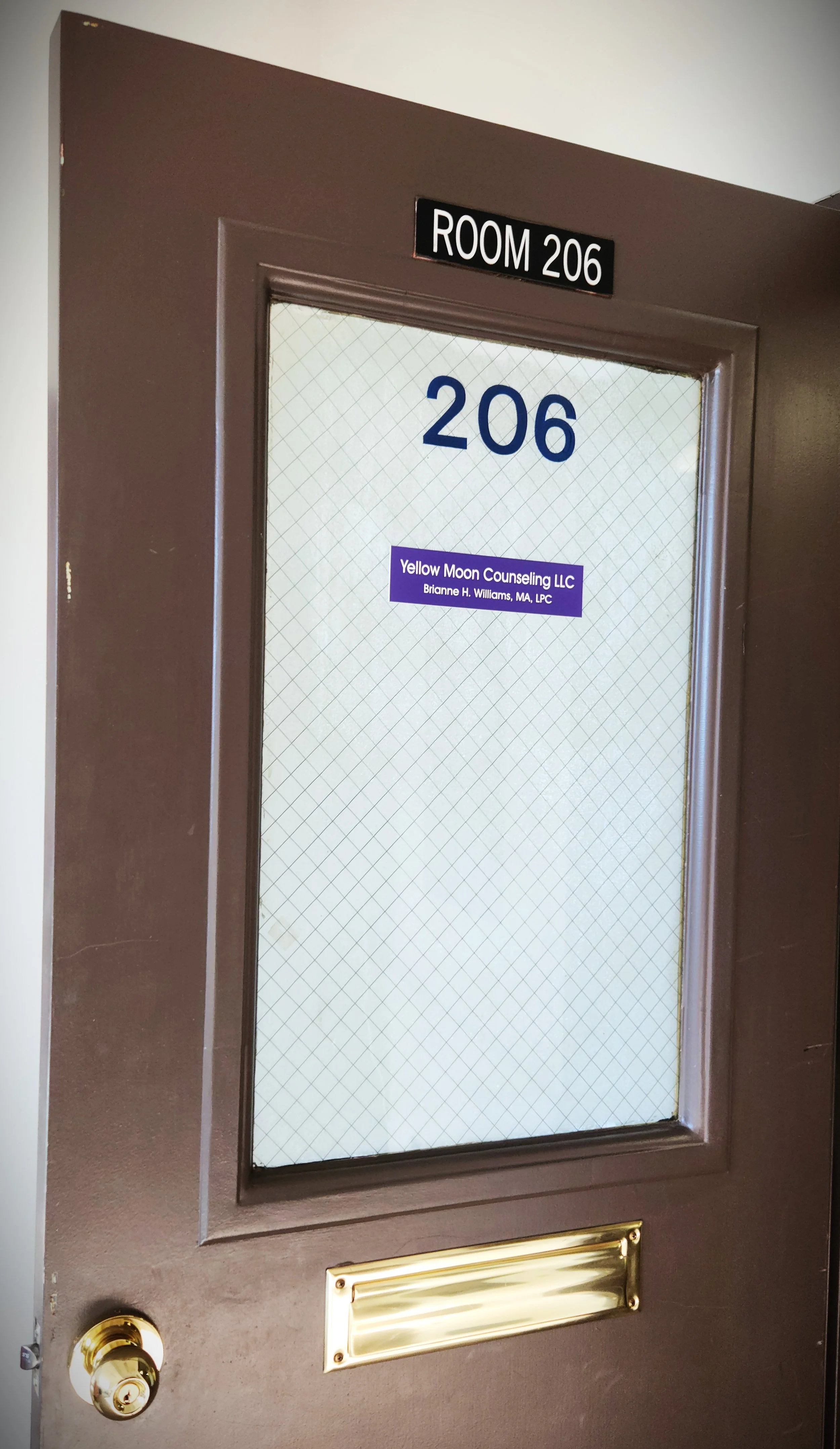 Photo of office door with name of practice on it