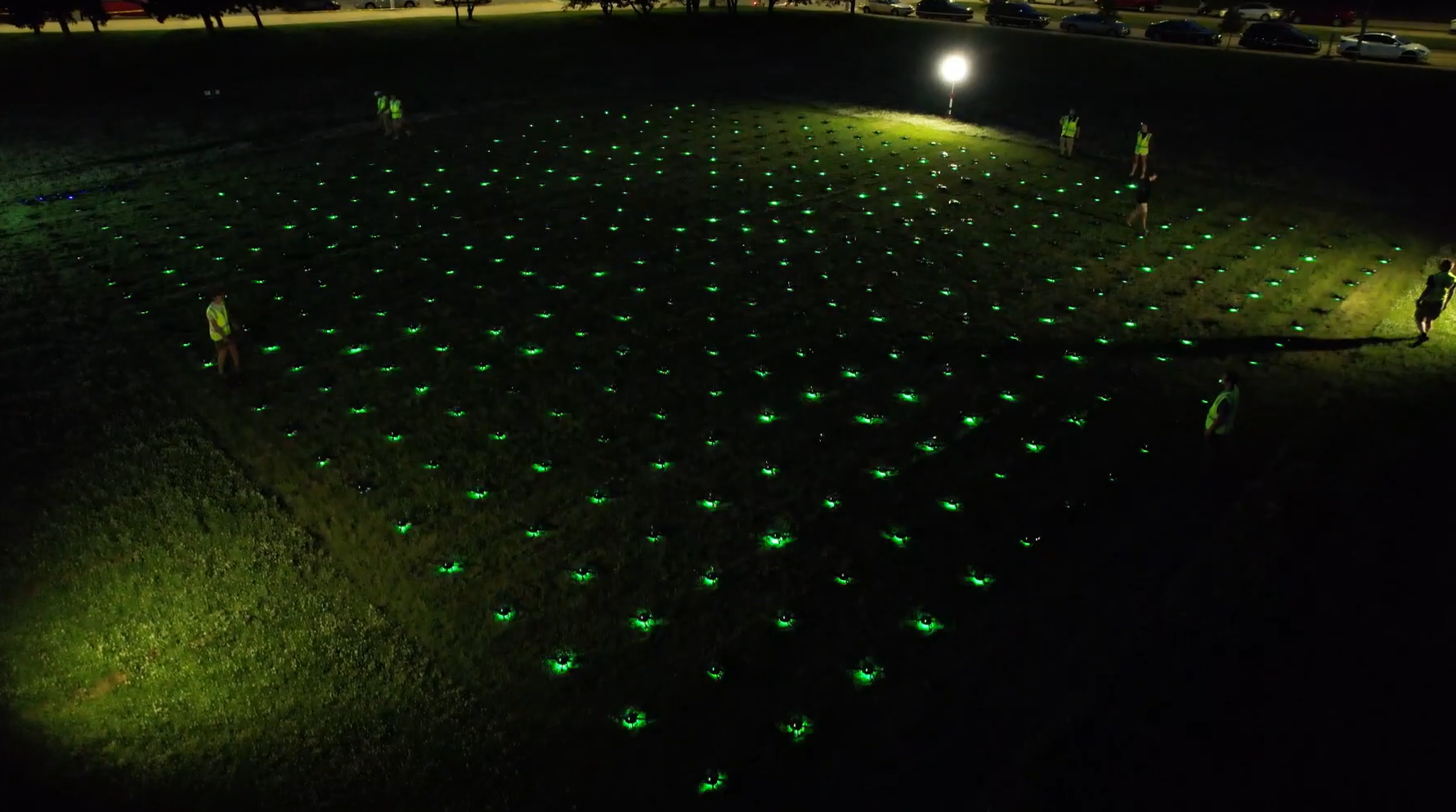 A launch pad for a drone show, showcasing hundreds of drones going through safety checks before take-off.