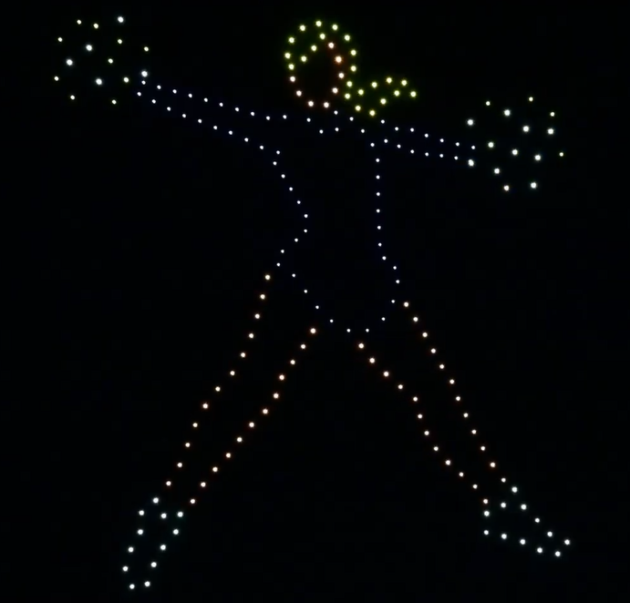 Drone show depicting a cheerleader at a sports game.