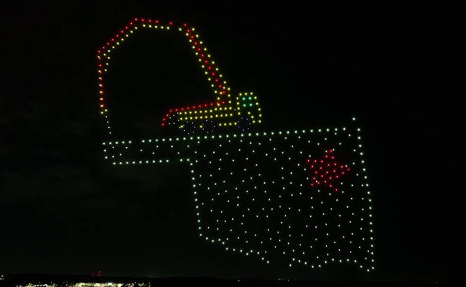 A drone show for a construction company in Oklahoma depicting their construction equipment.