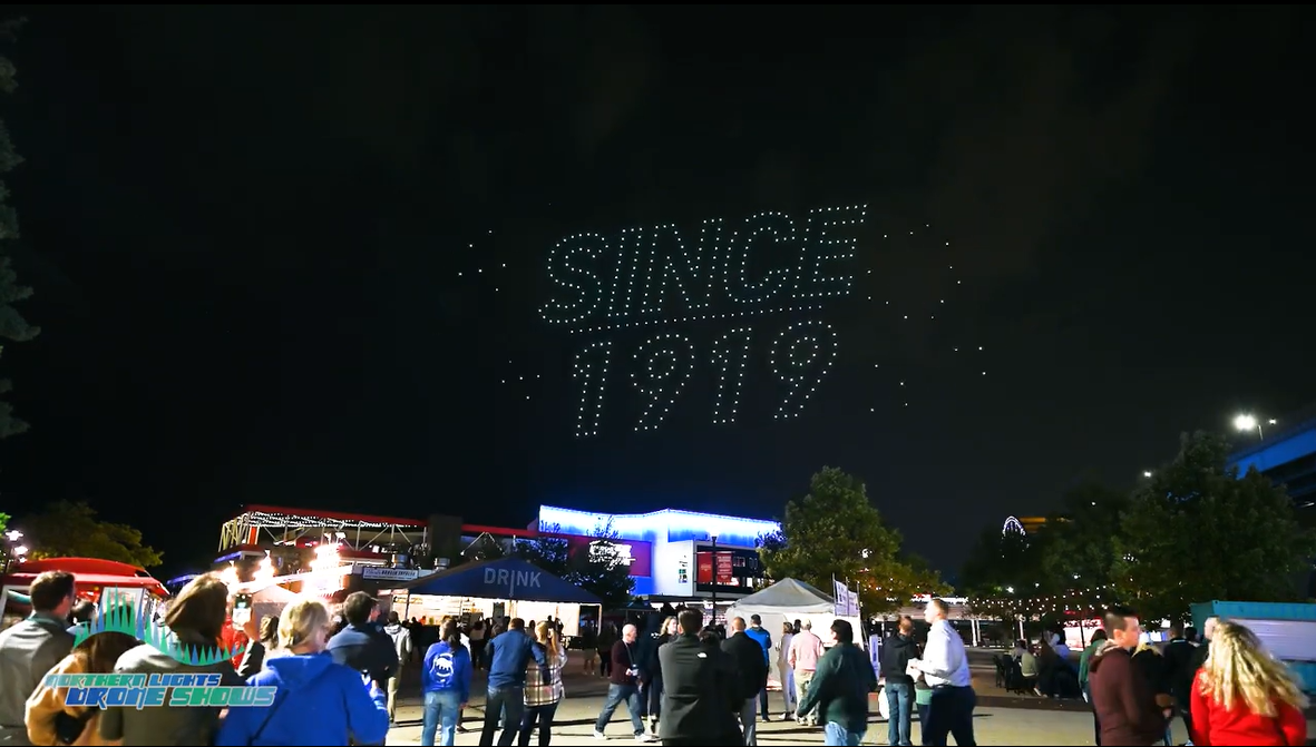 An image from an NLDS drone show above a festival ground.