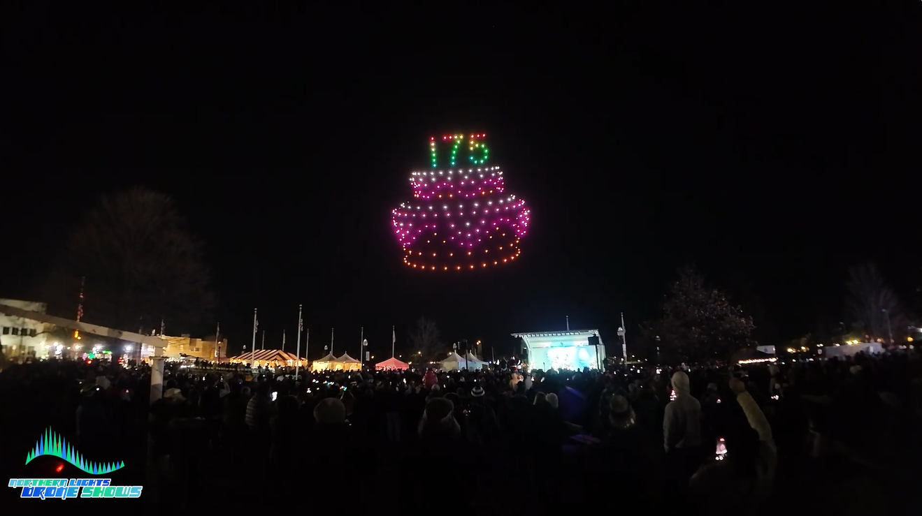 A drone show for the city of Kenosha currently depicting a cake with the numbers 175 on it.