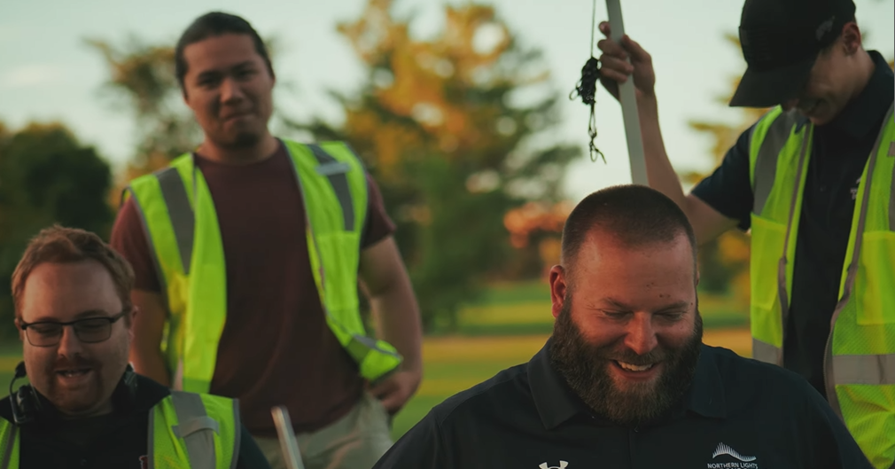 An image prior to an NLDS drone show of our pilots having fun while setting up.