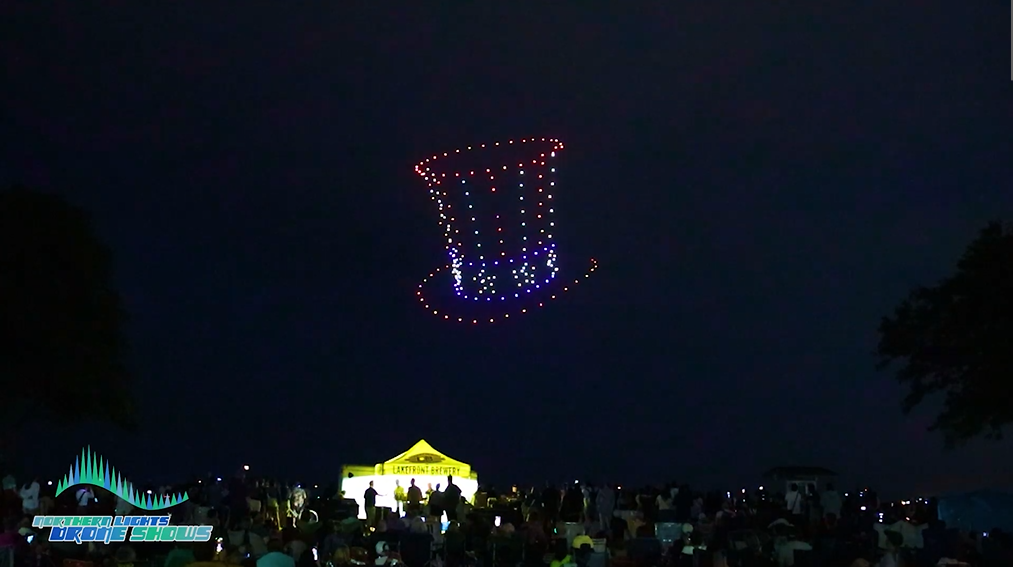 An image from an NLDS drone show depicting an Uncle Sam hat in the sky for the 4th of July celebration.