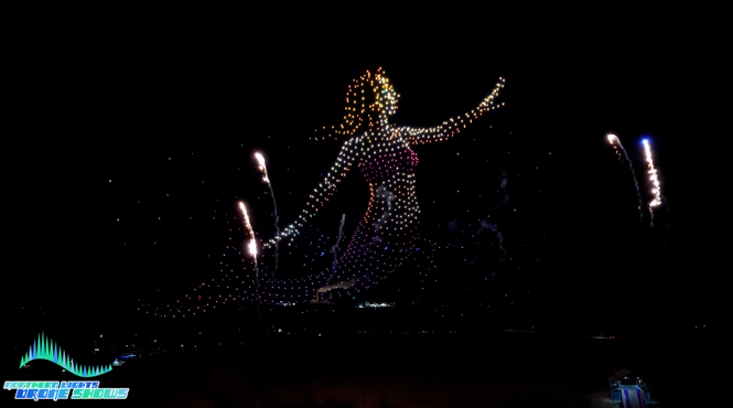 An image from an NLDS drone show depicting a mermaid with drones equipped with pyrotechnics.
