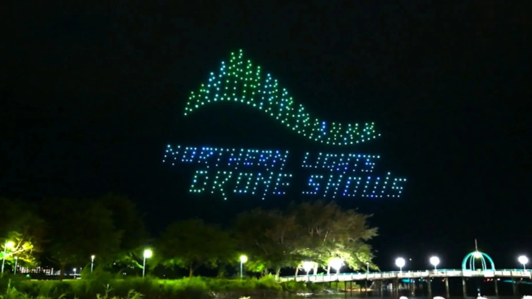 An image from an NLDS drone show depicting the NLDS logo in the sky.
